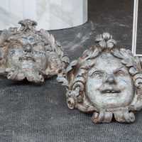 Two lead masks Louis XIV