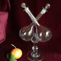 Consists of two flasks with long curved inverted necks