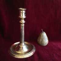 Candelabra Candlestick in brass, with frustoconical baluster shaft, ringed at the base and below the binet