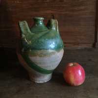 Norman carboy, 2 handles, partial green glazed earthenware