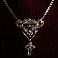 Necklace with chain and pendant decorated with scrolls and a cross, decorated with bressans enamels black with jewels set