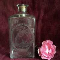 Bottle in molded blown glass with finely engraved decoration, for perfume or for rose water