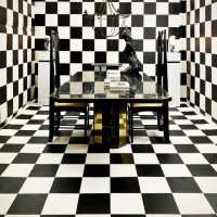 Table designed by Paco Rabanne in black portor marble and brass