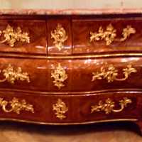 Very beautiful chest of drawers, from the regency period, in marquetry of violet wood.