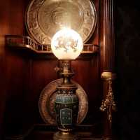 Pair of porcelain lamps with Baccarat globe, around 1880