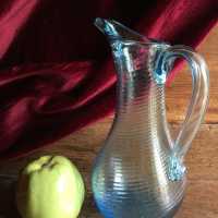 Elegant Norman pitcher, of slender shape, in blue blown glass