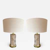 Pair of travertine and brass lamps. Italy 1990 in the style of the 1970s.