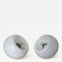 Pair of Space Age style Vacuna table, bedside or floor lamps in smoked white blown Murano glass, created by the Italian designer Eleanore Peduzzi-Riva for Artemide, late 1960s, produced in 1968 and produced in the 1970s. Double-position concave glass. Renowned manufacturers: Venini, Veronese, La Murrina, Aldo Carlo Nason for Mazzega, Stilnovo, Joe Colombo, Arteluce, Arredoluce, Lumi, Luci, Rggiani, Sciolari, Werner Pantone, Luigi Colani, Raak, Angelo Lelii, Angelo