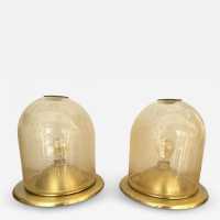 Pair of Space Age style table or bedside lamps in brass and gilded bubbled Murano glass by F. Fabbian. Famous designs by: Carlo Aldo Nason for Mazzega, Venini, Vistosi, La Murrina, Poliarte, Stilnovo, Arteluce, Arredoluce, Angelo Brotto for Esperia, Fontana Arte and Cristal Art.