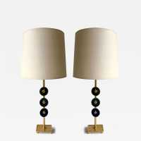 Pair of table or bedside lamps in gilded bronze-effect metal and enamel by Nicolas Dewael for Fondica. Signed Dewael. Famous artists who worked for the manufacturer, such as Pierre Casenove, Stéphane Galerneau and Mathias. Styles: Garouste and Bonetti, Giacometti, Maison Jansen, Baguès, Charles, Hollywood Regency, Mid-Century Modern and Brutalist style.