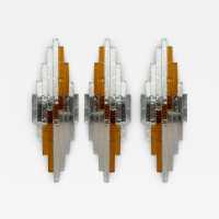 Mid-century Space Age wall lights in hammered glass and metal, in the Brutalist style, manufactured by the Poliarte factory in Verona, a competitor of Longobard Arte and Biancardi Jordan in the 1970s. Famous designers, such as Carlo Aldo Nason for Mazzega Murano, Venini, Vistosi, La Murrina, Esperia and Angelo Brotto.