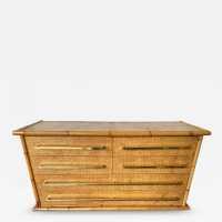 Chest of drawers from Vivai Del Sud, featuring a beautiful blend of bamboo, rattan, raffia, and wide brass handles. Designed by renowned designers such as Renato Zevi, Romeo Rega, Maison Jansen, Willy Rizzo, Mario Sabot, Hollywood Regency, Esperia, and Galerie Maison & Jardin.