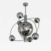 Astro Satellite Sputnik chandelier, space age, chrome-plated metal pendant light, six light points around the central sphere. Design attributed to the manufacturer-producer Reggiani. A typical Italian design of the mid-century modern period. Reggiani is a famous manufacturer, along with Gaetano Sciolari, Arredoluce, Arteluce, and Stilnovo.