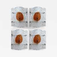 Pair of mid-century space age wall sconces in amber and clear textured Murano glass and metal backplate by Toni Zuccheri for Mazzega Manufacture. Famous Italian design like Venini, Vistosi, La Murrina, Aldo Nason, Stilnovo, Joe Colombo, Arteluce, Arredoluce, Lumi, Luci, Rggiani, Sciolari, Werner Pantone, Luigi Colani, Raak, Angelo Lelii, Angelo Brotto, Esperia, Francesco Bocola, Superstudio, Enrico Tronconi, Mario Bellini, Harvey Guzzini, Luigi Massoni, Martinelli, Pierre Cardin