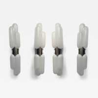 Space Age style torpedo gellule wall light by Carlo Nason for the Mazzega factory, in white smoked blown Murano glass, silver metal structure. Renowned manufacturers: Venini, Vistosi, La Murrina, VeArt, Seguso, Poliarte, Pierre Cardin, Stilnovo, Arteluce, Arredoluce, Luci and Lumi.