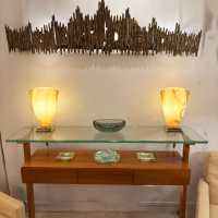 Grande applique en bronze, design Luciano Frigerio.