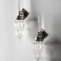 Pair of "Libertine" wall sconces by Mark Brazier-Jones, three-quarter view, cut glass arrows and pendants