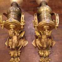 Étonnante suite de quatre appliques porte-lampes, milieu du XIXème siècle