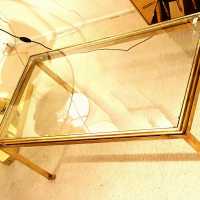 Paire de tables basses de la maison Ramsay en fer doré, XXème siècle