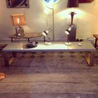 Coffee table stone and brass from Yves Saint Laurent shop in Paris