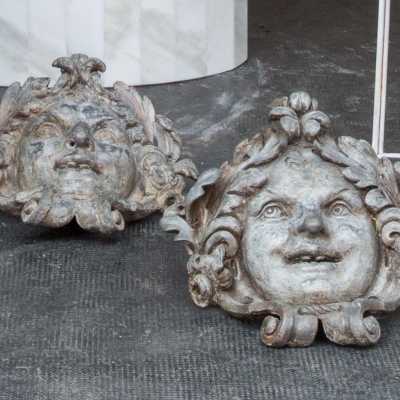 Two lead masks Louis XIV