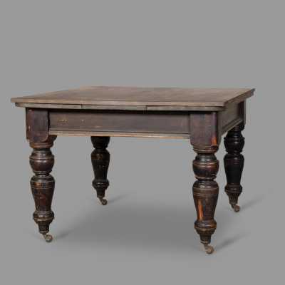Extendable blackened wood table