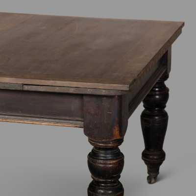 Extendable blackened wood table