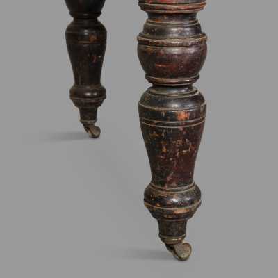 Extendable blackened wood table