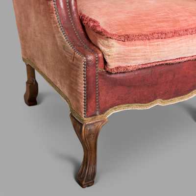 19th century Dutch armchair with red leather and velvet ears