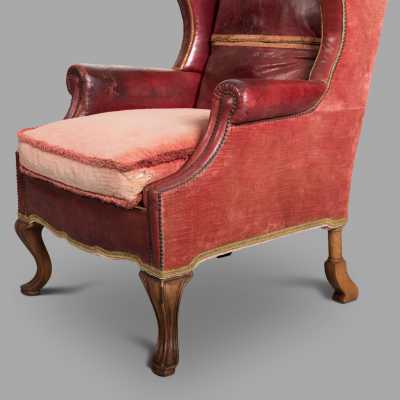 19th century Dutch armchair with red leather and velvet ears