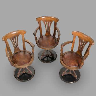Three 19th century steamer armchairs