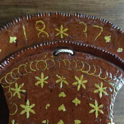 Typical geometric and symbolic shapes and shapes of this pottery production (hearts, crosses, circles, floral plants)