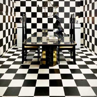 Table designed by Paco Rabanne in black portor marble and brass
