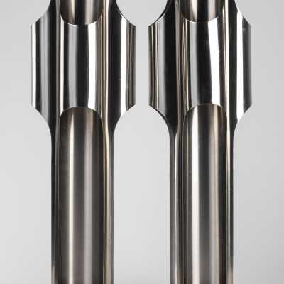 Maison Charles pair of stainless steel lamps