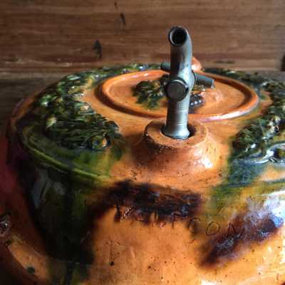Signed by the potter, under the tap: "Léon Valeçon"