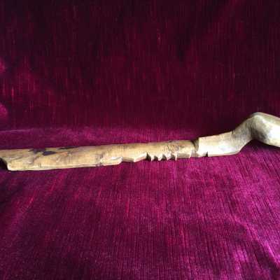 Beautiful original patina of this carved fruit-tree wood, monoxyl with hook at the top.