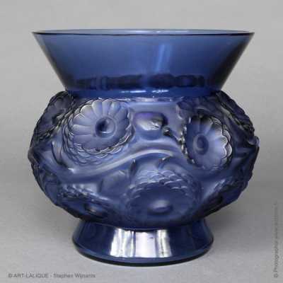 marigold vase in blue glass.