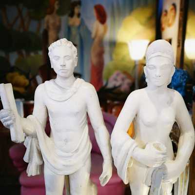Sculptures of an Aztec couple in resin