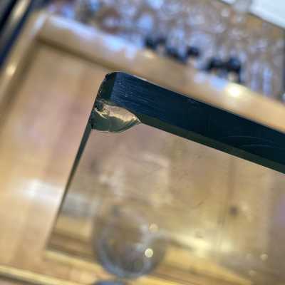 Chip below the glass