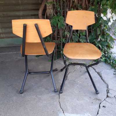 pair of wood and metal chairs