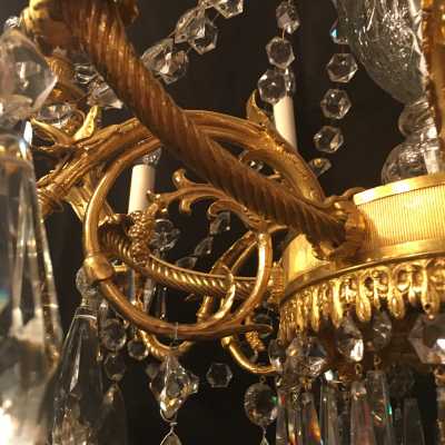 Lustre bronze à anges ailés