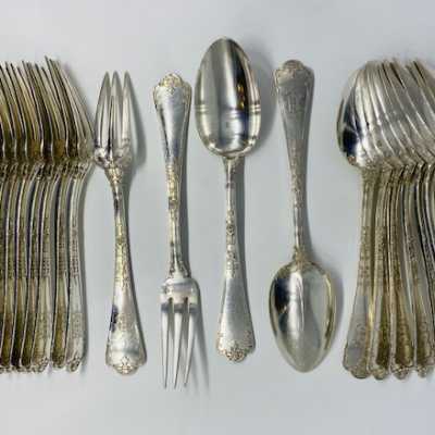 12 place settings. neck brace and silversmith's hallmarks