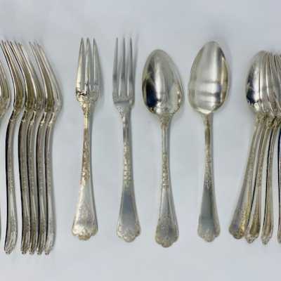 12 place settings. neck brace and silversmith's hallmarks