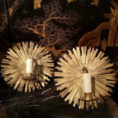 Sun shaped wall lights