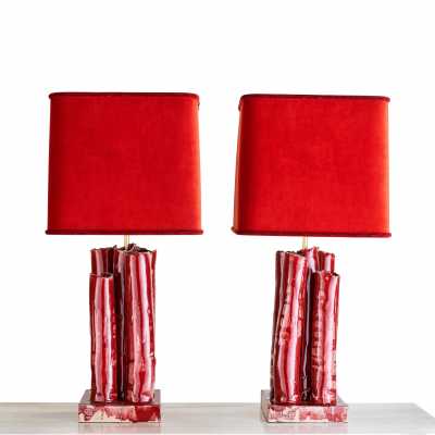 Pair of beef blood glazed ceramic lamps. Silk velvet shade.