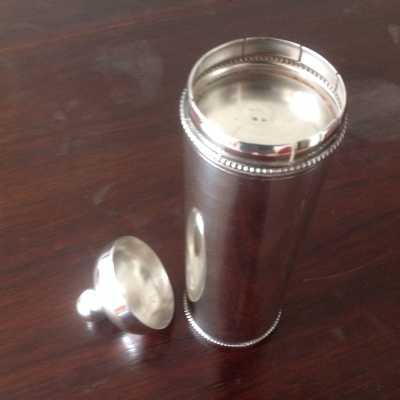 Old silver metal thermos