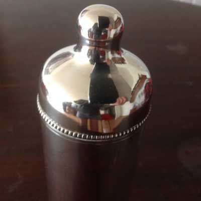 Old silver metal thermos