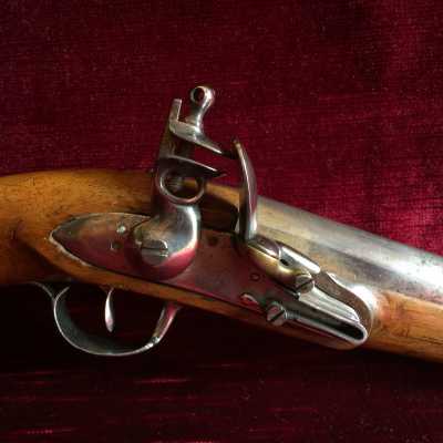 Iron fittings, bronze basin, walnut pistol grip. LV mark on the plate (no other visible mark)