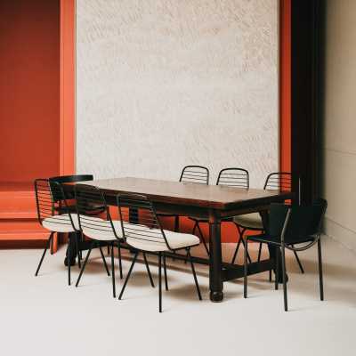 Wooden table and chairs by Starck