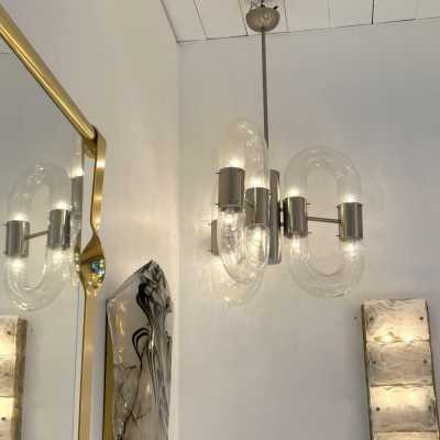 Mario Bellini, Harvey Guzzini, Luigi Massoni, Martinelli, Pierre Luster or Chain ring suspension in Murano glass and silver nickel-plated brass by Aldo Nason for Mazzega. Italy 1970. in the style of Venini, Veronese, La Murrina, Carlo Nason, Stilnovo, Joe Colombo, Arteluce, Arredoluce, Lumi, Luci, Rggiani, Sciolari, Werner Pantone, Luigi Colani, Raak, Angelo Lelii, Angelo Brotto, Esperia, Enrico Tronconi, Cardin, brass wall lamps mid-century modern space age chome metal